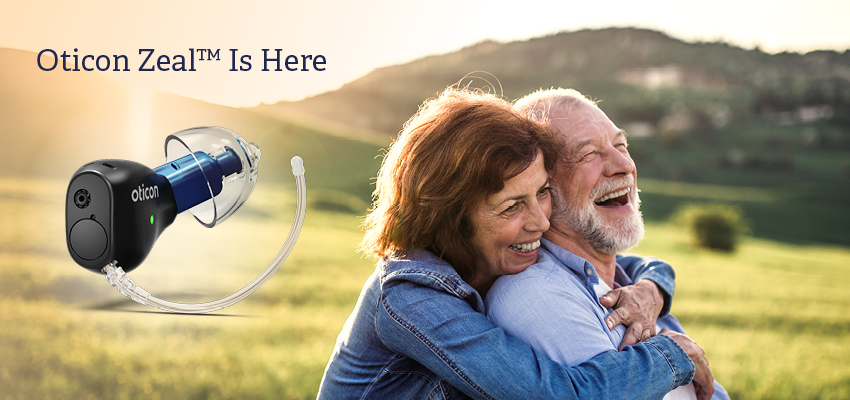 Older couple holding each other